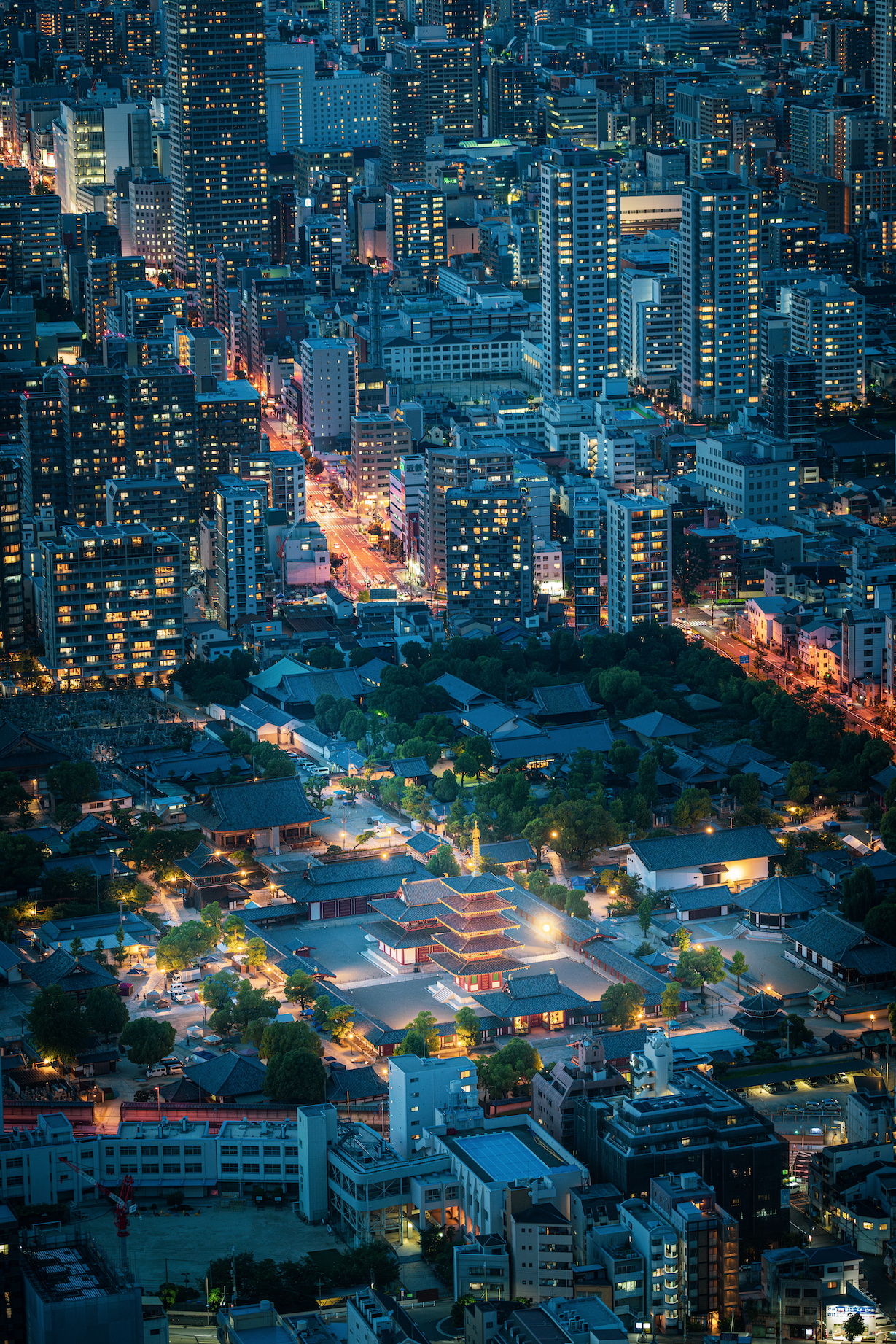 Aerial view of the Shitennoji Temple and its surrounding buildings at night